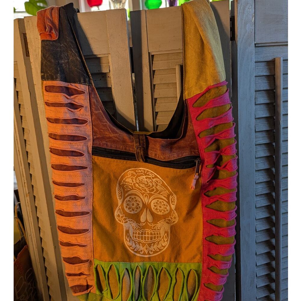 Multicolored patchwork fabric hobo bag with sugar skull